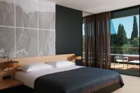 Posteľ alebo postele v izbe v ubytovaní Lone Hotel by Maistra Collection