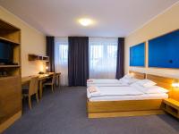Postel nebo postele na pokoji v ubytování Hotel Trend