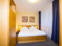 Postel nebo postele na pokoji v ubytování Hotel Trend