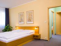 Postel nebo postele na pokoji v ubytování Hotel Trend