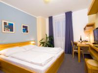 Postel nebo postele na pokoji v ubytování Hotel Trend