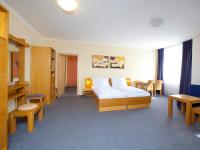 Postel nebo postele na pokoji v ubytování Hotel Trend