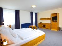 Postel nebo postele na pokoji v ubytování Hotel Trend