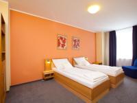 Postel nebo postele na pokoji v ubytování Hotel Trend