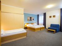 Postel nebo postele na pokoji v ubytování Hotel Trend