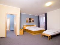 Postel nebo postele na pokoji v ubytování Hotel Trend