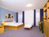 Postel nebo postele na pokoji v ubytování Hotel Trend