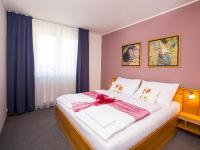 Postel nebo postele na pokoji v ubytování Hotel Trend