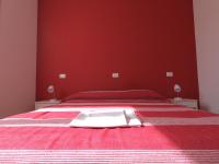 Posteľ alebo postele v izbe v ubytovaní Gardenia Guest House