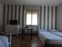 Posteľ alebo postele v izbe v ubytovaní Gardenia Guest House