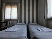 Posteľ alebo postele v izbe v ubytovaní Gardenia Guest House