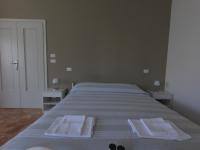 Posteľ alebo postele v izbe v ubytovaní Gardenia Guest House