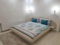 A bed or beds in a room at Safi