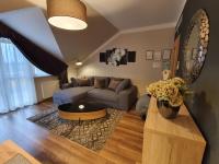 A seating area at Birdland Panorama Apartman