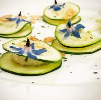 a group of cucumbers with blue flowers on them at Haus 26 Weißbriach in Weissbriach