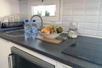 Kuchyňa alebo kuchynka v ubytovaní Mar&Mar, apartamento con solárium y piscina