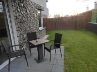 Vonkajšia záhrada v ubytovaní Apartament u Hippków