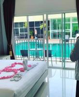 Bazén v ubytování Anantra Pattaya Resort nebo v jeho okolí