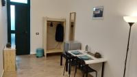 Televízia a/alebo spoločenská miestnosť v ubytovaní Policlinico Messina Bed&Bed