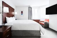 Ein Bett oder Betten in einem Zimmer der Unterkunft Club Quarters Hotel Embarcadero, San Francisco