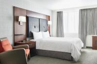 Ein Bett oder Betten in einem Zimmer der Unterkunft Club Quarters Hotel Embarcadero, San Francisco
