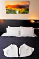 Posteľ alebo postele v izbe v ubytovaní 6 Bis HOTEL