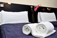 Posteľ alebo postele v izbe v ubytovaní 6 Bis HOTEL