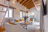 A television and/or entertainment centre at Genteel Home Feria