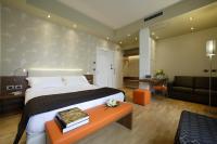 A bed or beds in a room at Hotel Forte del 48