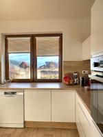 Kuchyňa alebo kuchynka v ubytovaní Panorama Home Valča