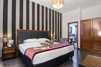 Posteľ alebo postele v izbe v ubytovaní Navona Colors Hotel