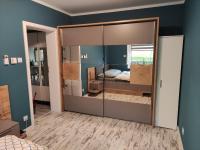 Posteľ alebo postele v izbe v ubytovaní Apartament u Hippków