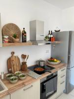 Kuchyňa alebo kuchynka v ubytovaní Villa Ypsilon Naxos - luxury holiday house with amazing sea view & private pool