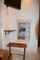 A television and/or entertainment centre at Trulli don Pietro