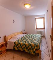 Posteľ alebo postele v izbe v ubytovaní Casa Angelina