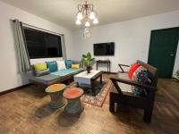 TV a/nebo společenská místnost v ubytování Miggi's Home