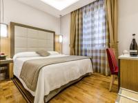 A bed or beds in a room at Vibe Nazionale