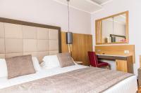 A bed or beds in a room at Vibe Nazionale
