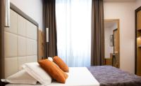 A bed or beds in a room at Vibe Nazionale
