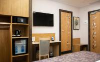 A bed or beds in a room at Vibe Nazionale