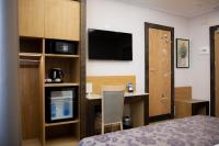 A bed or beds in a room at Vibe Nazionale