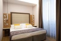 A bed or beds in a room at Vibe Nazionale