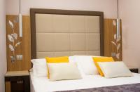 A bed or beds in a room at Vibe Nazionale