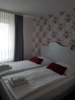 Postel nebo postele na pokoji v ubytování Hotel und Restaurant Rosenkranz