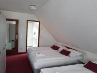Postel nebo postele na pokoji v ubytování Hotel und Restaurant Rosenkranz