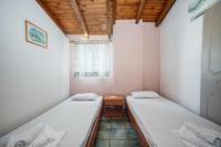 Postel nebo postele na pokoji v ubytování Georgia Apartments