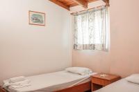 Postel nebo postele na pokoji v ubytování Georgia Apartments