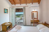 Postel nebo postele na pokoji v ubytování Georgia Apartments
