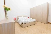 Posteľ alebo postele v izbe v ubytovaní CA CICOGNA air conditioning and fast WiFi, central location apartment
