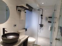 a bathroom with a sink and a toilet and a shower at RF Hotel - Zhongxiao in Taipei